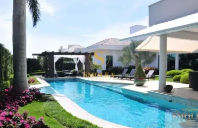 Casa em condomínio fechado com 5 quartos à venda na rua dos pirajus, jurerê internacional, florianópolis, 998 m2 por r$ 22.000.000