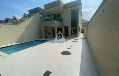 Casa triplex de alto padrão no interlagos quality 2: luxo e conforto na barra da tijuca