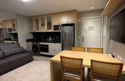 Flat no coração da meia praia mobiliado renda anual de r$ 80.000,00