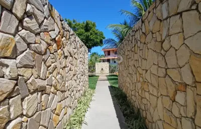 Bangalô de luxo mobiliado em condomínio pé na areia – 3 quartos, espaço gourmet | piscina  e vista mar em serrambi!