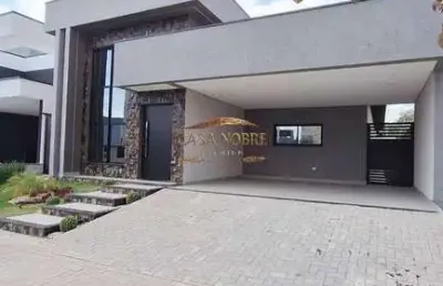 Casa em condomínio fechado com 3 dormitórios e lazer completo