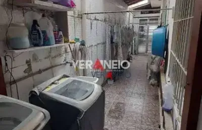 Casa com 2 dormitórios à venda por r$ 450.000,00 - tupi - praia grande/sp