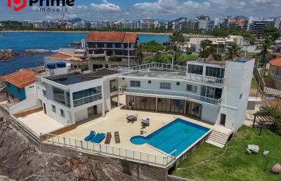 Espetacular casa à venda com 5 suítes em cima da pedra e de frente para o mar da enseada azul em nova guarapari/es. marque uma visita e se apaixone!