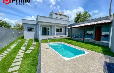 Casa linear em nova guarapari com área gourmet e vista para a lagoa disponível para venda