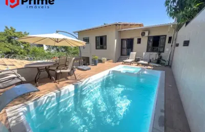 Casa duplex à venda em nova guarapari com 4 suítes, piscina e área gourmet. um luxo!