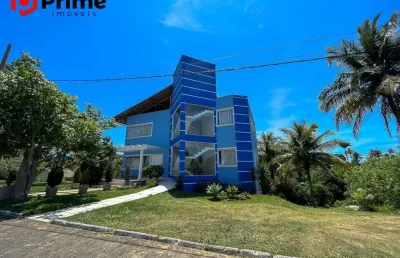 Casa com excelente area externa à venda no condomínio lagoa da praia em guarapari/es.
