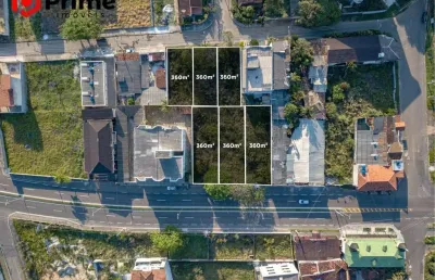 Terreno residencial e comercial à venda na enseada azul de frente para rodovia.