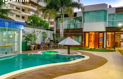 Extraordinária casa a venda na enseada azul de frente para a lagoa e a poucos metros das melhores praias de guarapari. agende já a sua visita!