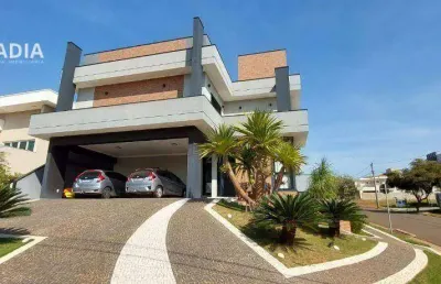Casa com 4 dormitórios à venda, 325 m² por r$ 2.690.000,00 - condomínio terras do cancioneiro - paulínia/sp