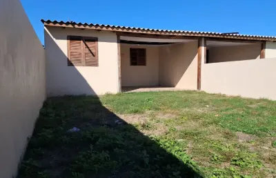 Excelente casa geminada no bairro centro de cidreira escriturada e 100% averbada