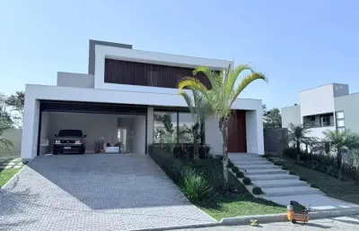 Luxuosa casa no costão golf village: 450 m², 5 suítes, pronta para morar, condomínio clube