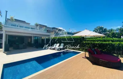 Linda casa dentro de condomínio pé na areia na praia de juquehy !