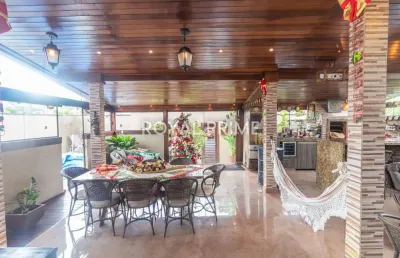 Casa térrea de rua com edícula, piscina e 4 suítes à venda, 420 m² - santa felicidade - curitiba/pr