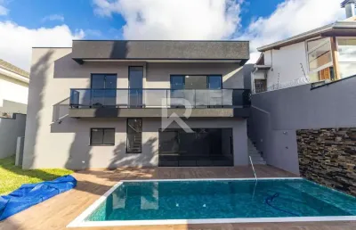 Casa térrea com jardim + piscina aquecida, 3 suítes, 4 vagas à venda – mossunguê - curitiba/pr