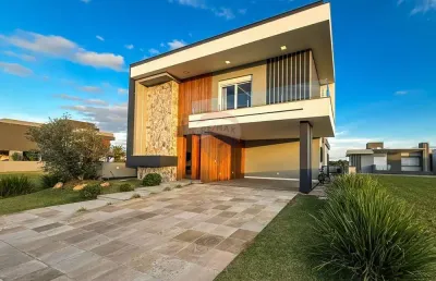 Casa com piscina, 4 dormitórios à venda condomínio reservas do lago nova santa rita rs