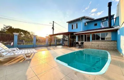 Casa com 3 dormitórios e piscina, no bairro mato grande em canoas -rs