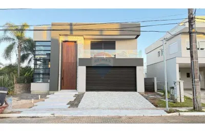 Casa de condomínio de alto luxo para venda com 4 suítes, bairro marechal rondon em canoas/rs