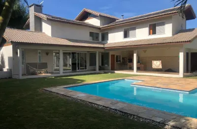 Casa espetacular no condomínio ecopark lagos, com 4 dormitórios sendo 2 suítes. conceito aberto,  pé direito alto.  possui 2 lotes. área gourmet fantástica com uma piscina ampla e glamourosa, com jard