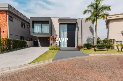 Casa sofisticada com 4 suítes e integração total dos ambientes 4 vagas 388 m2