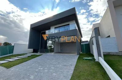 Luxo e exclusividade no arquipélago de manguinhos: casa com 4 suítes, área gourmet e piscina privativa em condomínio fechado