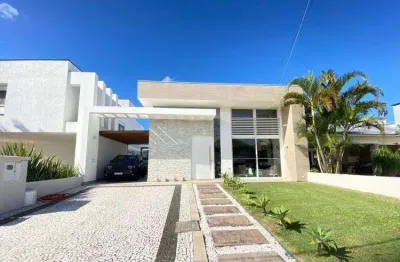 Casa em condomínio fechado com 3 quartos à venda na avenida central, 2000, zona nova, capão da canoa por r$ 2.300.000