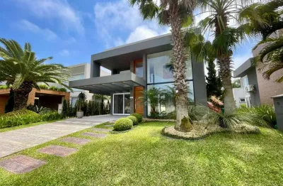 Casa em condomínio fechado com 5 quartos à venda na rua rio novo, 2672, centro, xangri-lá, 265 m2 por r$ 4.280.000