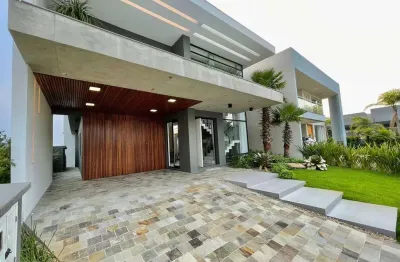 Casa em condomínio fechado com 4 quartos à venda na estrada do mar, 1200, parque antártica, capão da canoa, 310 m2 por r$ 3.990.000