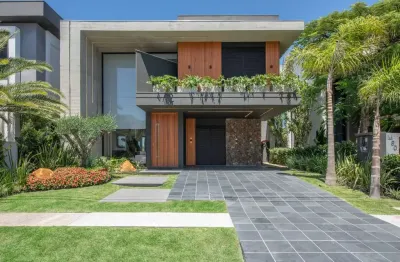 Casa em condomínio fechado com 4 quartos à venda na estrada do mar, 1200, parque antártica, capão da canoa, 331 m2 por r$ 3.950.000