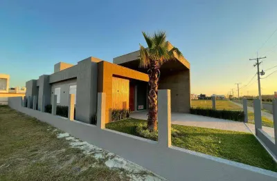 Casa em condomínio fechado com 4 quartos à venda na estrada do mar, 300, zona nova, capão da canoa por r$ 1.060.000