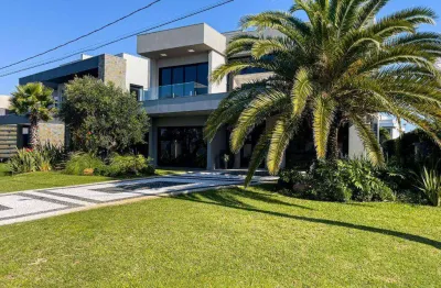 Casa em condomínio fechado com 5 quartos à venda na rua rio jacuí, 1331, centro, xangri-lá por r$ 5.489.000