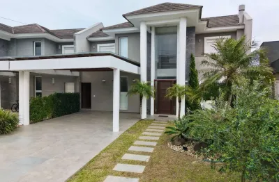 Casa em condomínio fechado com 4 quartos à venda na avenida central, 1100, noiva do mar, xangri-lá, 220 m2 por r$ 1.590.000
