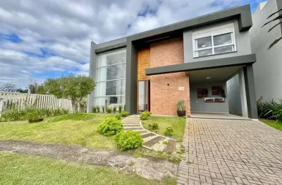 Casa em condomínio fechado com 4 quartos à venda na estrada do mar, 1200, parque antártica, capão da canoa por r$ 3.200.000