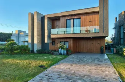 Casa em condomínio fechado com 5 quartos à venda na avenida paraguassu, 1570, capão novo, capão da canoa por r$ 6.900.000