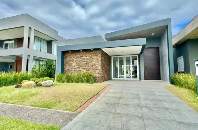 Casa em condomínio fechado com 4 quartos à venda na estrada do mar, 1200, parque antártica, capão da canoa por r$ 2.300.000