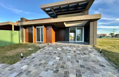 Casa em condomínio fechado com 4 quartos à venda na estrada do mar, 00, centro, xangri-lá por r$ 1.599.000