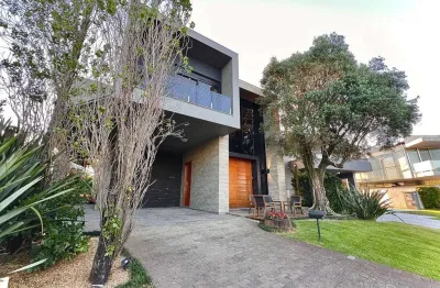 Casa em condomínio fechado com 6 quartos à venda na rua rio jacuí, 1331, centro, xangri-lá, 540 m2 por r$ 8.270.000