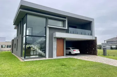 Casa em condomínio fechado com 4 quartos à venda na avenida paraguassu, 1570, capão novo, capão da canoa por r$ 3.500.000