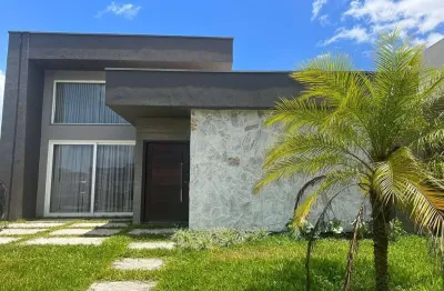 Casa em condomínio fechado com 4 quartos à venda na rua onório germano, 2009, zona nova, capão da canoa, 180 m2 por r$ 1.790.000
