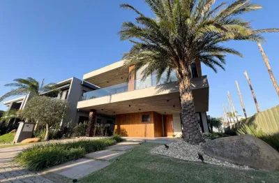 Casa em condomínio fechado com 5 quartos à venda na estrada do mar, 1200, parque antártica, capão da canoa, 460 m2 por r$ 5.800.000