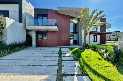 Casa em condomínio fechado com 4 quartos à venda na rua rio divisa, 34, centro, xangri-lá, 217 m2 por r$ 1.990.000