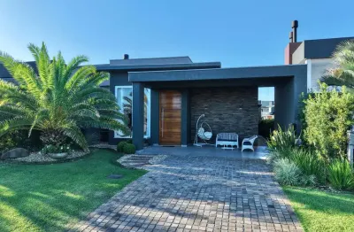 Casa em condomínio fechado com 4 quartos à venda na avenida diamente, 1173, centro, xangri-lá por r$ 2.190.000