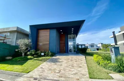 Casa em condomínio fechado com 4 quartos à venda na estrada do mar, 1200, parque antártica, capão da canoa, 196 m2 por r$ 2.770.000