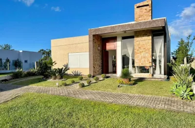 Casa em condomínio fechado com 3 quartos à venda na rua onório germano, 2009, zona nova, capão da canoa, 187 m2 por r$ 1.650.000