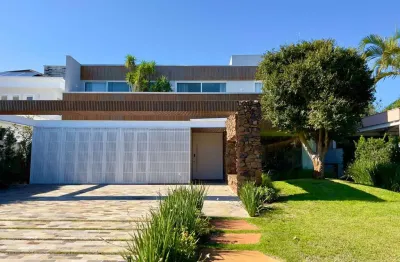 Casa em condomínio fechado com 5 quartos à venda na avenida central, 2500, atlântida, xangri-lá por r$ 6.000.000