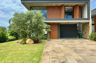 Casa em condomínio fechado com 4 quartos à venda na rua rio divisa, 750, centro, xangri-lá, 270 m2 por r$ 3.850.000