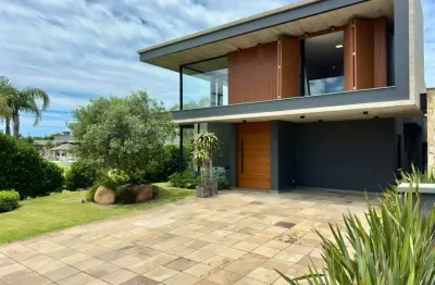 Casa em condomínio fechado com 4 quartos à venda na rua rio divisa, 750, centro, xangri-lá, 270 m2 por r$ 3.950.000