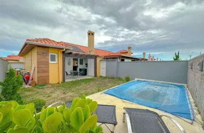 Casa em condomínio fechado com 2 quartos à venda na avenida central, 1001, noiva do mar, xangri-lá, 70 m2 por r$ 650.000