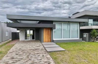 Casa em condomínio fechado com 4 quartos à venda na avenida paraguassu, 1570, capão novo, capão da canoa, 210 m2 por r$ 2.900.000