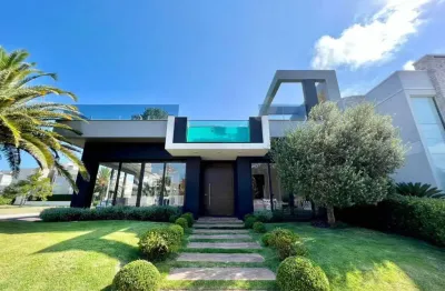 Casa em condomínio fechado com 4 quartos à venda na estrada do mar, 1000, velas da marina, capão da canoa, 405 m2 por r$ 6.800.000