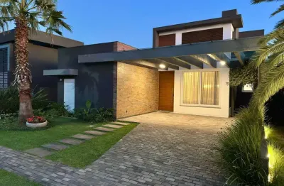 Casa em condomínio fechado com 4 quartos à venda na estrada do mar, 1200, parque antártica, capão da canoa, 195 m2 por r$ 3.190.000